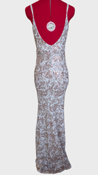 White with gold sequins floral design dress on a mannequin against a white background
